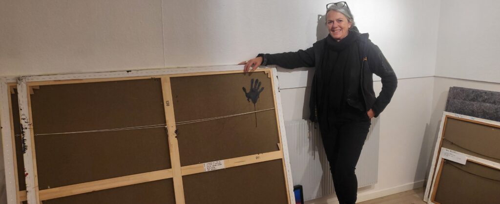 Anita Cramer Corpas with the visual art selected for the juried art exhibition at Dronninglund Art Center 2023.